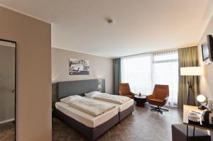 Arthotel ANA Neotel 객실 침대