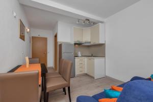 Kuchyň nebo kuchyňský kout v ubytování Apartments Ferdo
