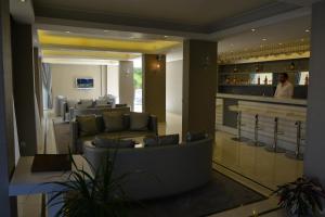 The lobby or reception area at Winecity Hotel