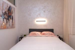 Una cama o camas en una habitación de Anna