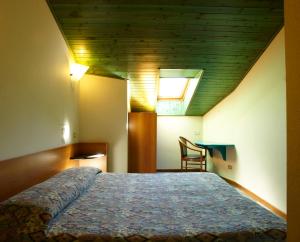 Ліжко або ліжка в номері Residence Mirelladue