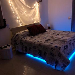 Postel nebo postele na pokoji v ubytování B&B Planet