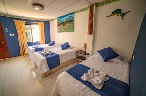 Voodi või voodid majutusasutuse Hostal Gladismar toas