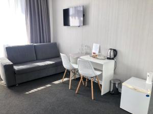 Posezení v ubytování MEDELEAN HOTEL