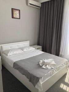 Postel nebo postele na pokoji v ubytování MEDELEAN HOTEL