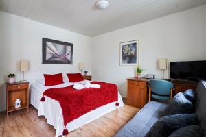 Кровать или кровати в номере Guest House Porvoo