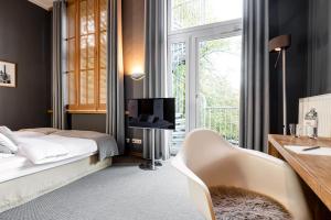 Llit o llits en una habitació de YoHo - The Young Hotel