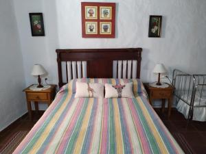 Posteľ alebo postele v izbe v ubytovaní Casa Antoñita
