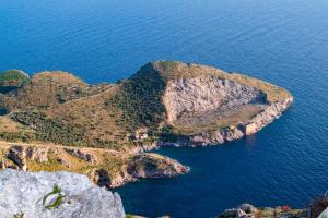 an aerial view of an island in the ocean at Il Profumo di Capri in Massa Lubrense