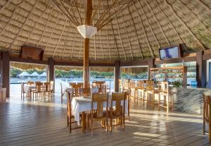 A restaurant or other place to eat at The Placencia