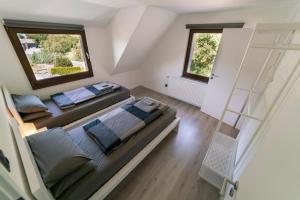 Postel nebo postele na pokoji v ubytování North Loop Rooms