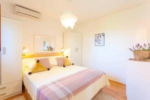 Postel nebo postele na pokoji v ubytování Holiday Home Nona