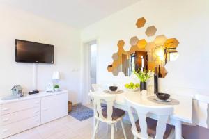 TV a/nebo společenská místnost v ubytování Holiday Home Nona