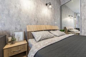 Ένα ή περισσότερα κρεβάτια σε δωμάτιο στο Comfort Town Love Home
