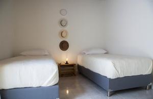 Giường trong phòng chung tại Apartamento remodelado en el mejor sitio del centro de Medellín Home Aris 401
