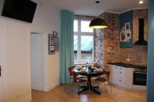 Kuchnia lub aneks kuchenny w obiekcie Dominican Square by Hashtag Apartments