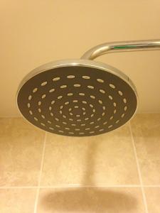 a metal strainer sitting on top of a sink at Hill View Hotel in Blackburn