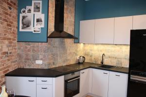Kuchnia lub aneks kuchenny w obiekcie Dominican Square by Hashtag Apartments