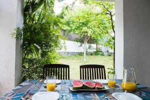 Frukostalternativ för gäster på Hauzify I Villa Parc