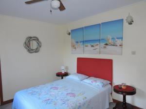 A bed or beds in a room at Amazing Beach View Apartments