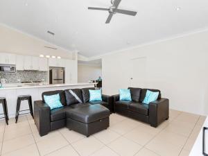 A seating area at Casuarina Escape by Kingscliff Accommodation