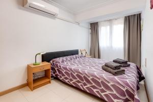Posteľ alebo postele v izbe v ubytovaní Apartamento Boliche