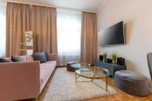 TV a/nebo společenská místnost v ubytování campus Horn