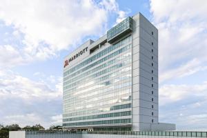 a building with a sign on the top of it at Clark Marriott Hotel in Clark