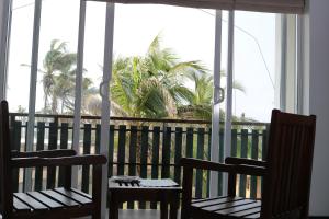Balkón nebo terasa v ubytování Saprin Beach Resort