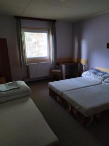 Postel nebo postele na pokoji v ubytování Apartmany Bobule