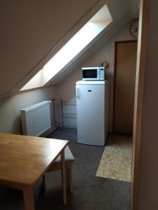 Kuchyň nebo kuchyňský kout v ubytování Apartmany Bobule