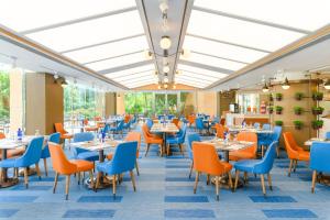 A restaurant or other place to eat at Hong Kong Gold Coast Hotel