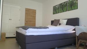 מיטה או מיטות בחדר ב-Nussböckgut