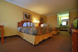 Postel nebo postele na pokoji v ubytování Americas Best Value Inn Killeen Ft Hood