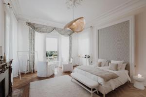 Postel nebo postele na pokoji v ubytování La Villa Guy & Spa - Teritoria