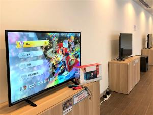 Televisyen dan/atau pusat hiburan di HOTEL PIN Jiaoxi