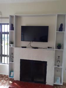 TV a/nebo společenská místnost v ubytování Madison guest house