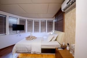 Postel nebo postele na pokoji v ubytování Liveaboard Adora