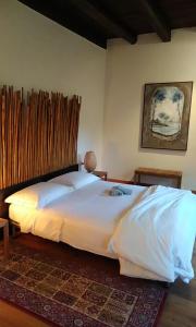 Een bed of bedden in een kamer bij Ca' del Tajo