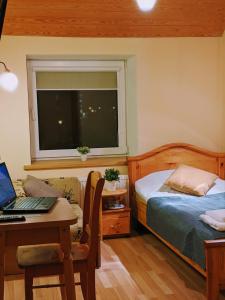 Postel nebo postele na pokoji v ubytování Guest House Kamara