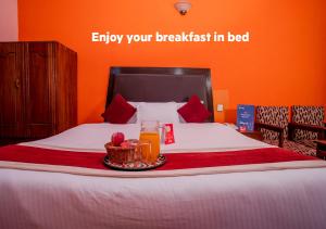 Rúm í herbergi á Hotel Premium