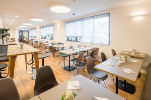Um restaurante ou outro lugar para comer em Hotel Cult Frankfurt City