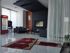 a living room with couches at ماجيك سويت صباح السالم Magic suite sabah Alsalem in Kuwait