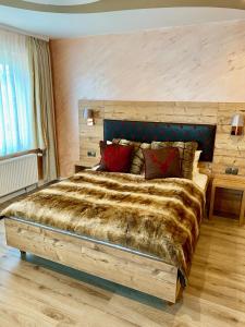 Postel nebo postele na pokoji v ubytování Boutique Hotel Goldene Henne