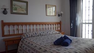 Postel nebo postele na pokoji v ubytování PINOS 11 MENYBER