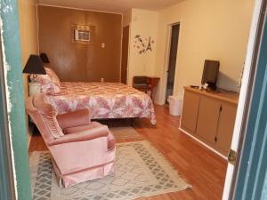 Postel nebo postele na pokoji v ubytování Canton Motel