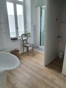 Ванна кімната в Chambres d'Hôtes des Rouets