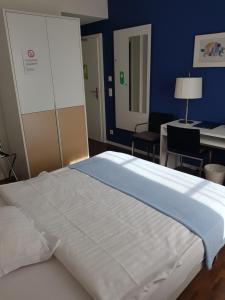 Letto o letti in una camera di Auberge de Prangins