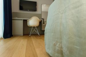 TV a/nebo společenská místnost v ubytování Buzë Boutique Hotel
