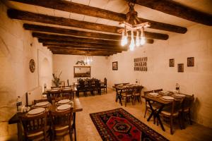 Reštaurácia alebo iné gastronomické zariadenie v ubytovaní Ortahisar Cave Hotel